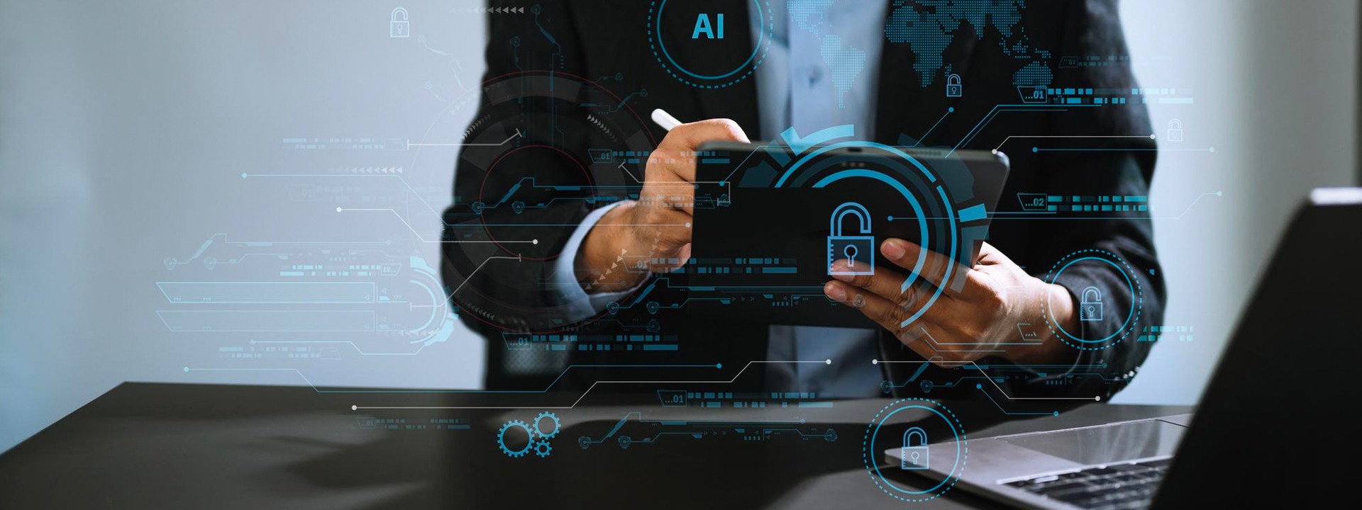 A man in a suit is using a laptop with an icon on it.